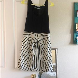 Black dress with white stripped attached skirt